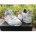 AIR JORDAN 4 RETRO KAWS COOL GREY